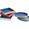 Shown in blue, light grey, burgundy, and black faux leather.