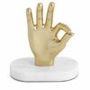 Shown in shiny gold casted aluminum and white marble.
