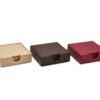 Shown in sand, brown, and burgundy faux leather.