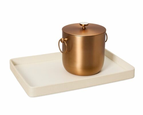 Shown in ivory and shagreen ivory faux leather and matte copper stainless steel with iridescent acrylic detailing. Ice bucket is double lined with 18/8 stainless steel.
