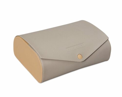 Shown in light textured grey and sand faux leather with grey suede.