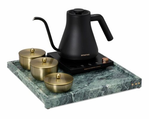 Shown in champagne brass stainless steel and forest green marble with brass inlay.